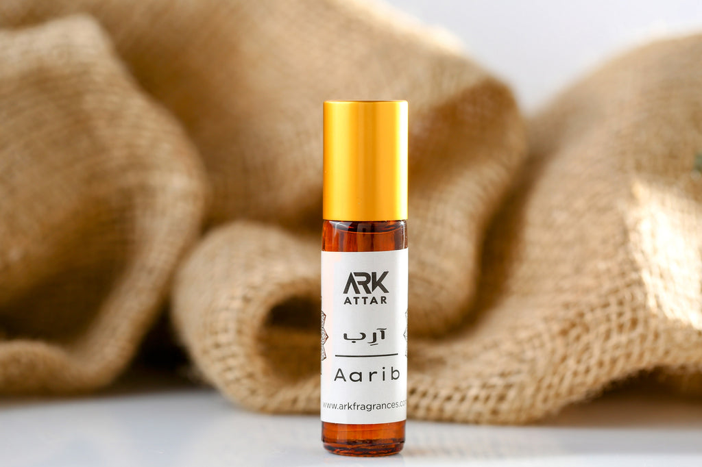 Aarib Attar by ARK Fragrances 6ml premium concentrated perfume oil. A natural earthy blend of Sandalwood Musk and Amber notes perfect for daily wear. We offer this best selling organic attar in Karachi, original scent in Lahore, luxury fragrance in Islamabad, and fast delivery in Rawalpindi Multan Peshawar Gujranwala Hyderabad Quetta and all over Pakistan