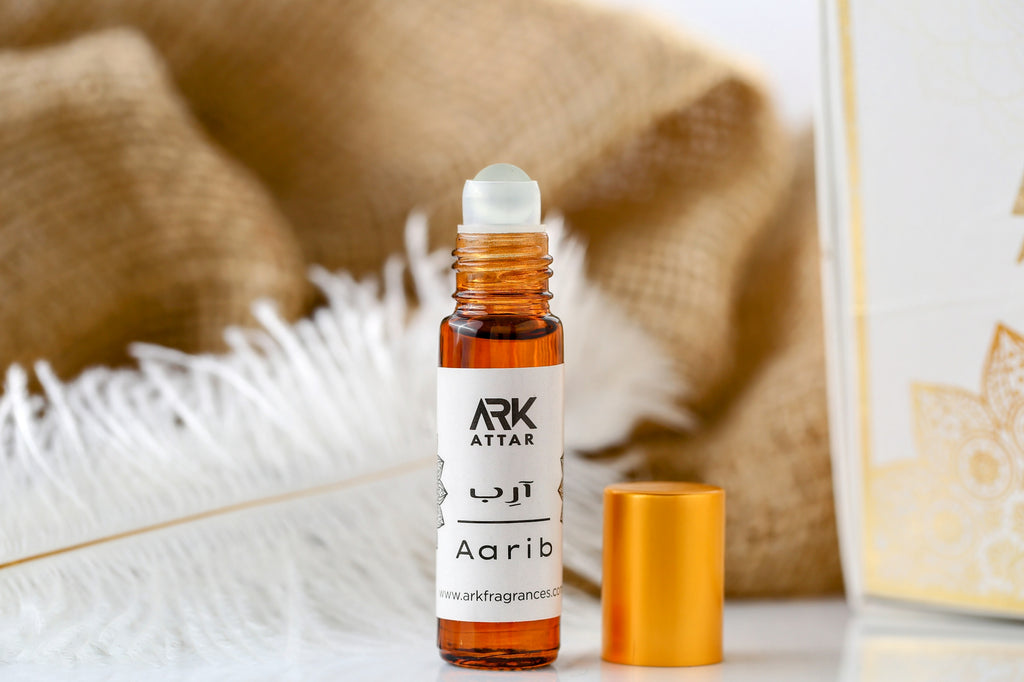 Aarib Attar by ARK Fragrances 6ml premium concentrated perfume oil with beautiful packaging. A soothing natural blend of Sandalwood Musk and Amber notes perfect for all seasons. We offer fast nationwide delivery all over Pakistan including Karachi Lahore Islamabad Rawalpindi Multan Peshawar Gujranwala Hyderabad Quetta and Sialkot