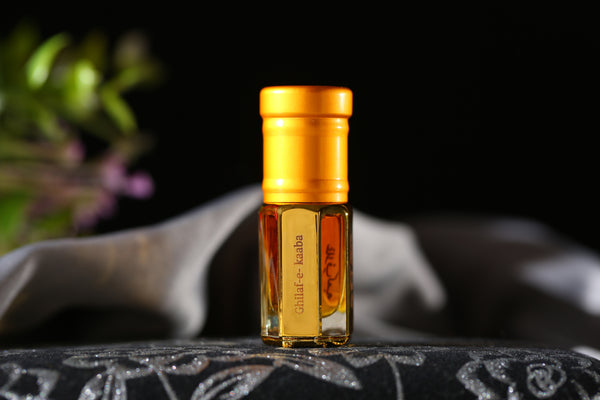 Ghilaf-e-Kaaba Attar by ARK Fragrances in premium gold bottle. Spiritual long-lasting perfume oil with deep musky notes. Best alcohol-free Islamic scent in Pakistan.