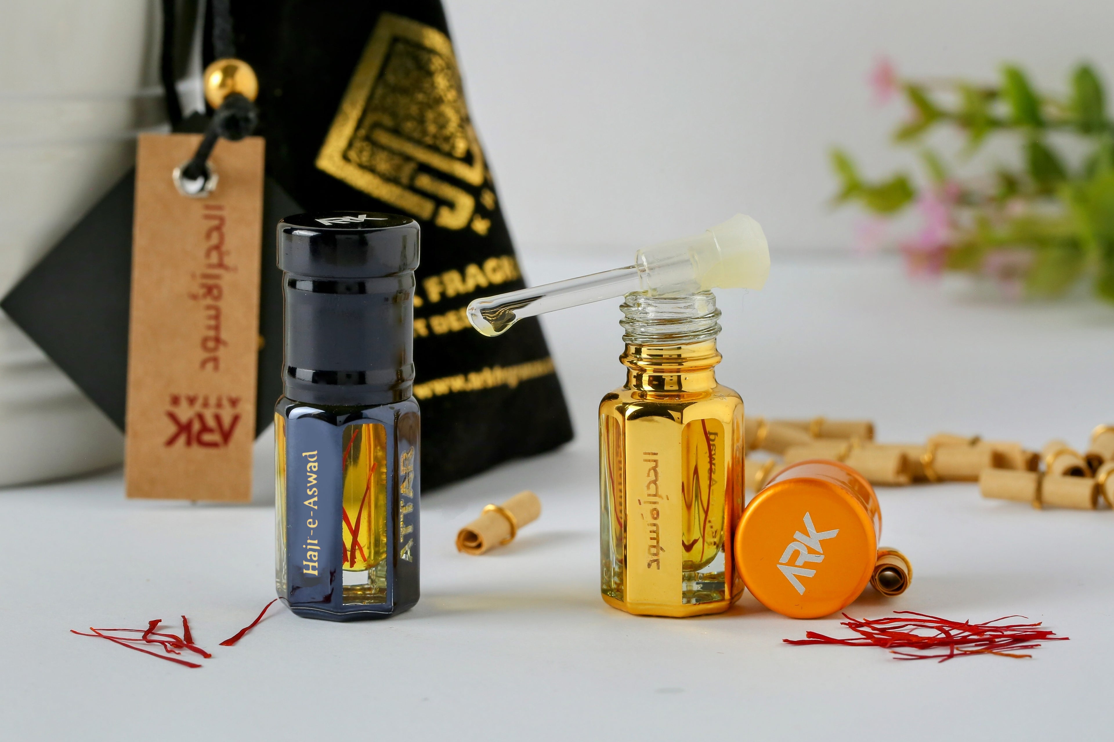 Hajr e Aswad Attar by ARK Fragrances 3ml premium concentrated perfume oil in black and gold bottles with glass stick applicator and velvet pouch packaging best Islamic gift online delivery in Lahore Karachi Islamabad Faisalabad and Pakistan
