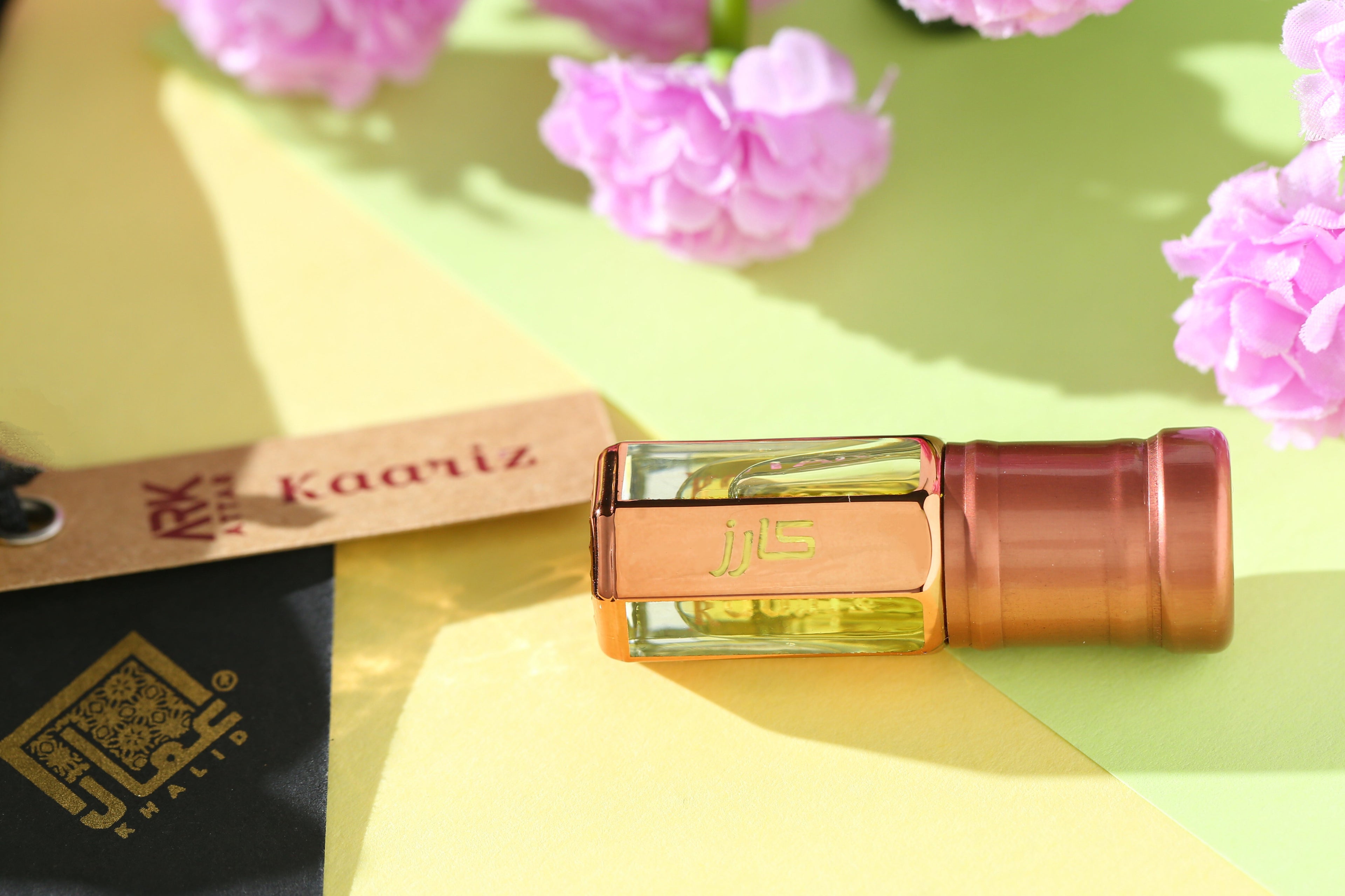 Kaariz Attar by ARK Fragrances premium concentrated perfume oil with pink flowers fresh spring scent alcohol free available in 3ml best floral fragrance