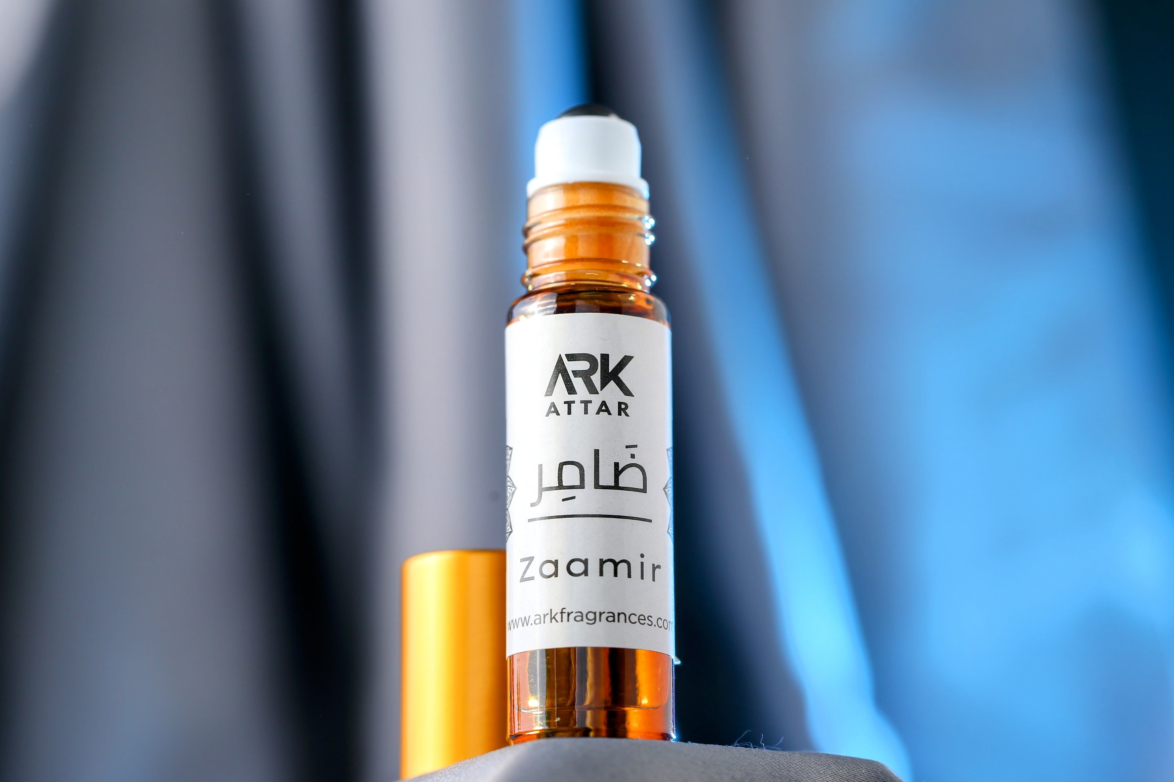 Zaamir Attar by ARK Fragrances 6ml premium concentrated perfume oil. A refreshing blend of Citrus Musk and soft Floral notes perfect for daily wear. We offer this best selling fresh scent in Karachi, original perfume in Lahore, luxury attar in Islamabad, and fast delivery in Rawalpindi Multan Peshawar Gujranwala Hyderabad Quetta and all over Pakistan