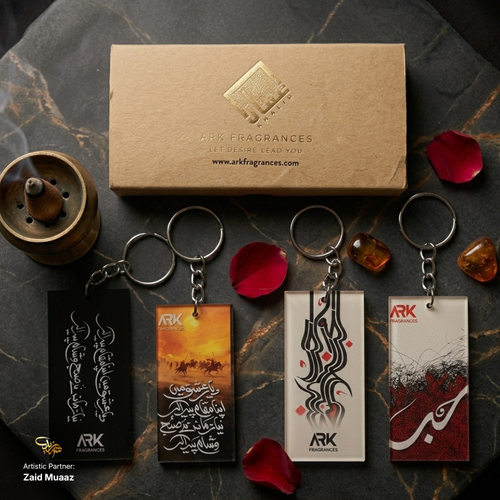 Buy the best luxury gift box for husband or fiancé online in Pakistan. This aesthetic ARK Fragrances gift set includes a beautiful Urdu poetry calligraphy keychain by Zaid Muaaz and a premium, long-lasting attar perfume oil. Elevate your gifting game with authentic, high-end grooming essentials that offer far superior projection and quality compared to Scents n Stories or J. dot perfumes. The ultimate choice for customized corporate gifts and premium men's fragrances delivered across Pakistan.