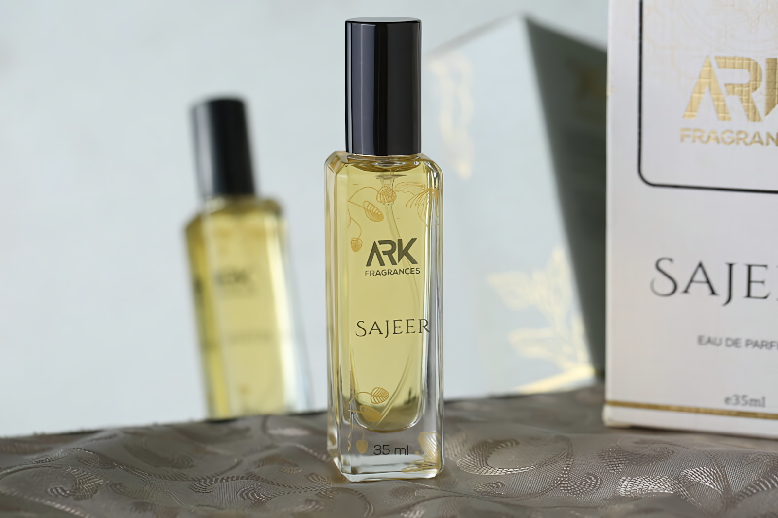 Aesthetic product photography of Sajeer 35ml fragrance by ARK Fragrances in a green leafy setting, emphasizing its natural freshness and citrus-woody notes ideal for daily office wear.